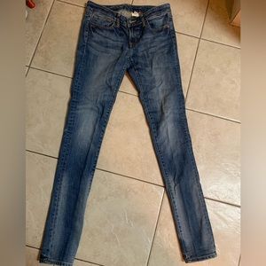 Uniqlo brand skinny jeans. Size 2 (fits more like size 0). Very slim lower leg.